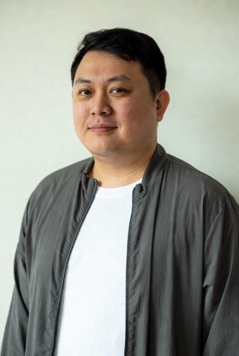 Model wearing a plain lightweight jacket from the outerwear range